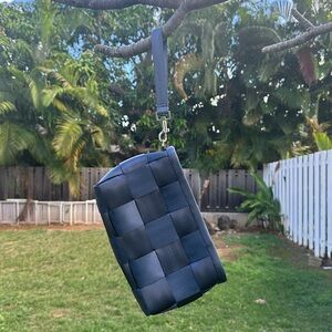 Harvey’s seatbelt bag clutch 
Vintage (early 2000s)